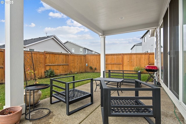 view of patio with a grill