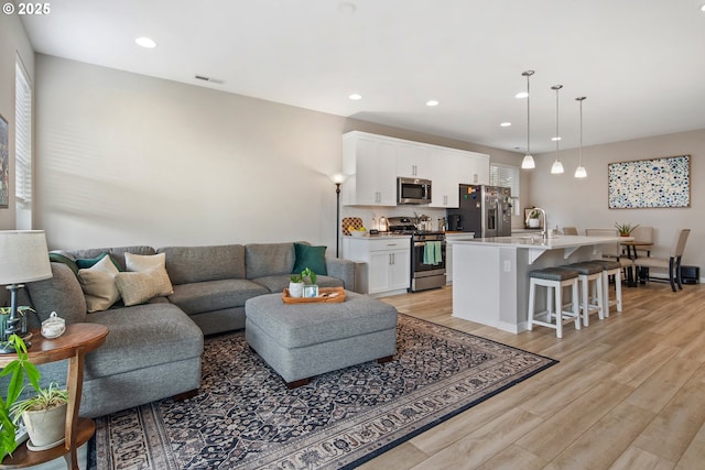 living room featuring light hardwood / wood-style floors