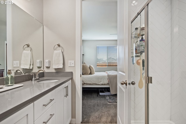 bathroom featuring vanity and a shower with shower door