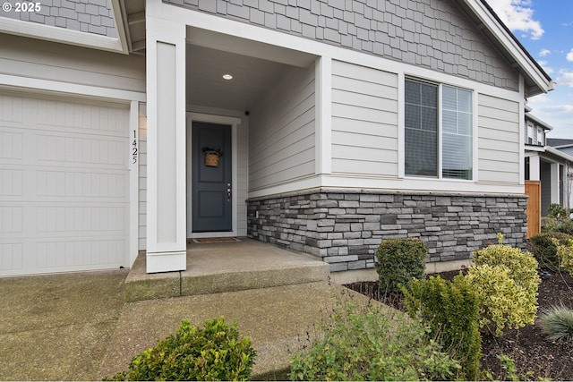 property entrance featuring a garage