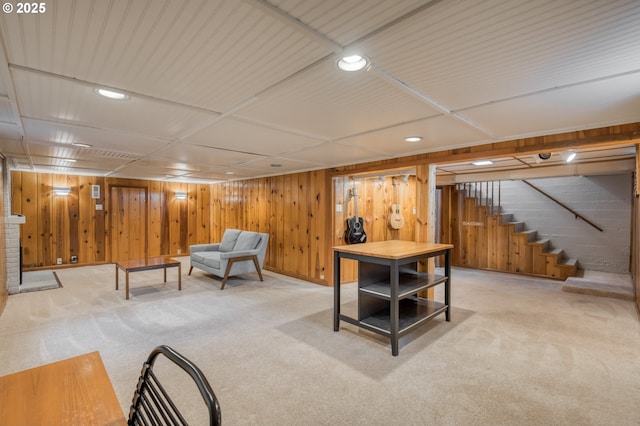office area with recessed lighting, carpet, and wood walls