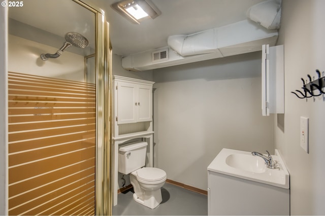 bathroom with toilet, vanity, concrete flooring, and baseboards