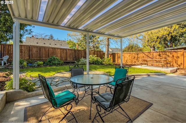 view of patio featuring outdoor dining area