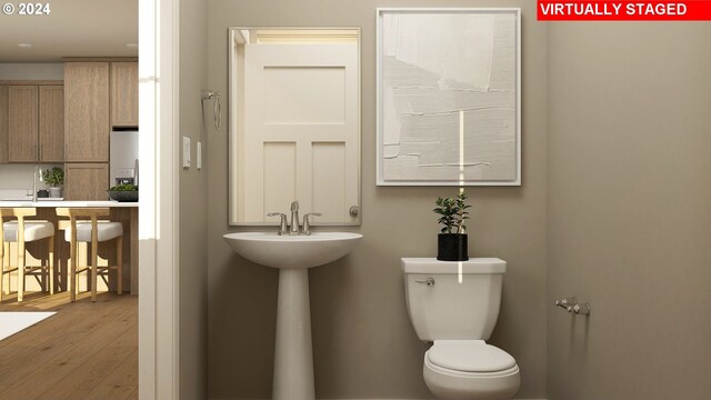 7370 SE Butternut Creek Pkwy, Hillsboro, OR 97123 - bathroom featuring wood-type flooring and toilet
