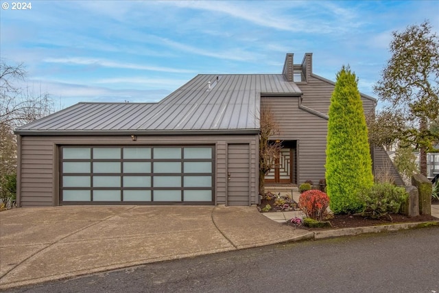 view of front of property with a garage