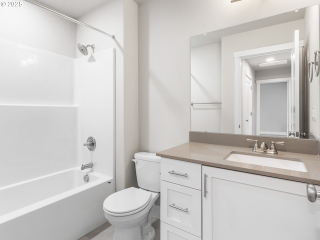 full bathroom featuring toilet, vanity, and shower / washtub combination