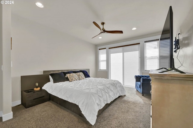 bedroom with multiple windows, ceiling fan, and carpet floors