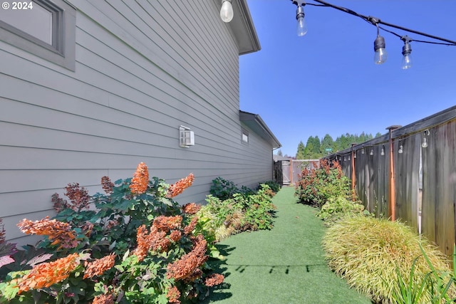 view of home's exterior featuring a yard