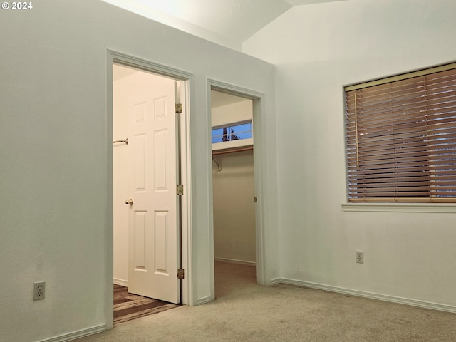 interior space featuring lofted ceiling