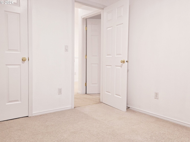 interior space with light colored carpet