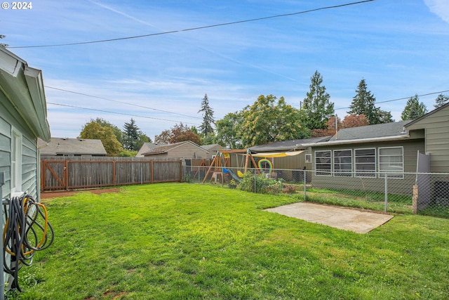 view of yard featuring a playground