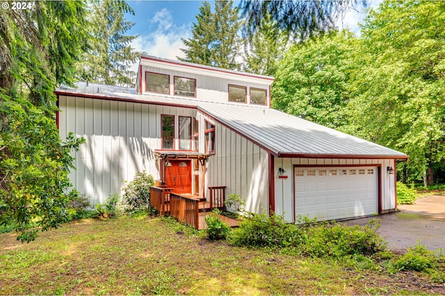 view of front of property with a garage