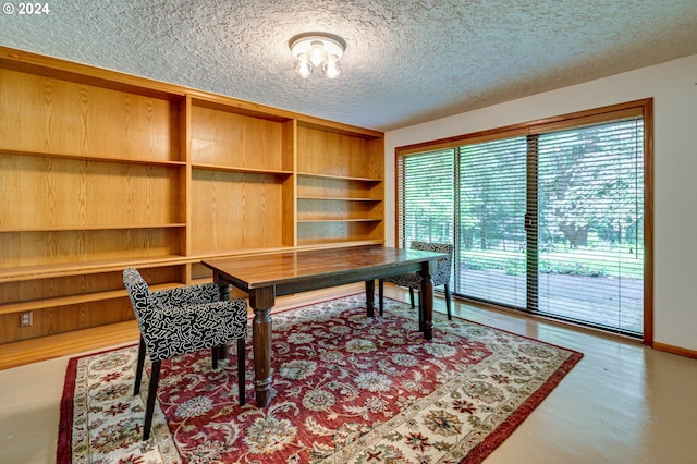 office space featuring a textured ceiling