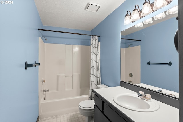 full bathroom with vanity, toilet, shower / bathtub combination with curtain, and a textured ceiling