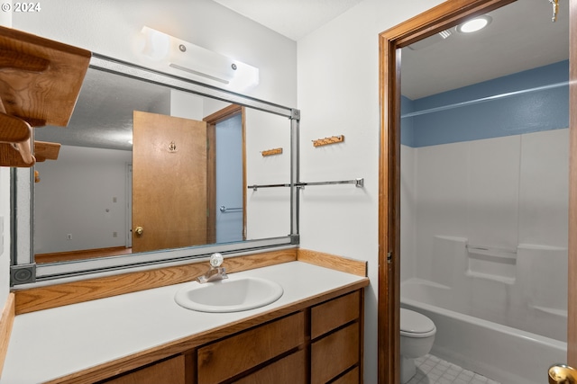 full bathroom with vanity,  shower combination, and toilet