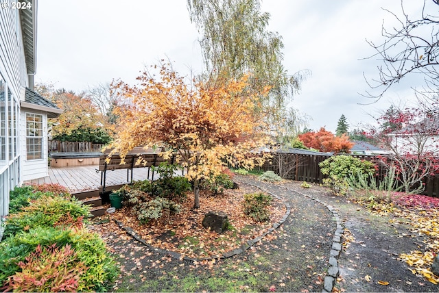 view of yard featuring a wooden deck