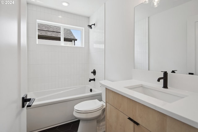 full bathroom featuring tile patterned flooring, tub / shower combination, vanity, and toilet