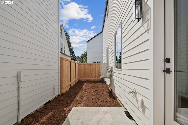 view of property exterior with fence