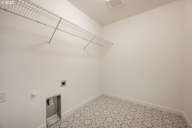 laundry room featuring hookup for an electric dryer