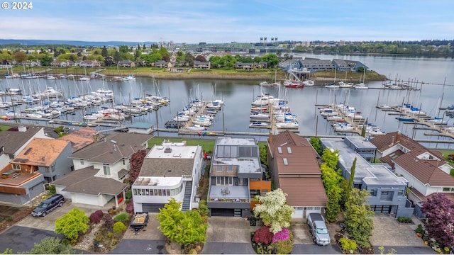 bird's eye view with a water view