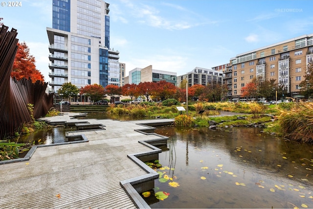 view of community with a water view