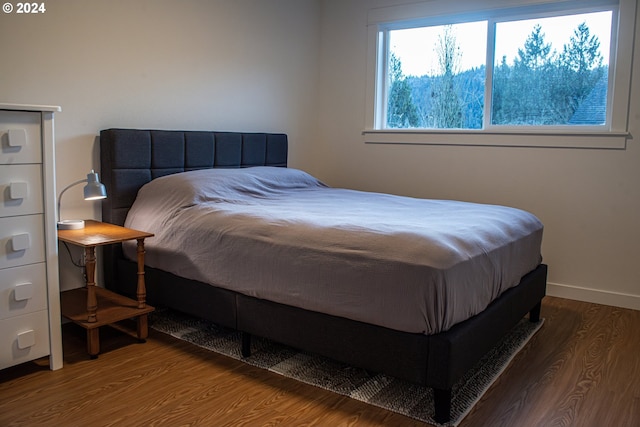 bedroom featuring hardwood / wood-style flooring