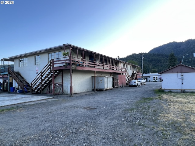432 2nd Ave, Powers, OR 97466 - view of dirt / gravel road with stairs and a mountain view