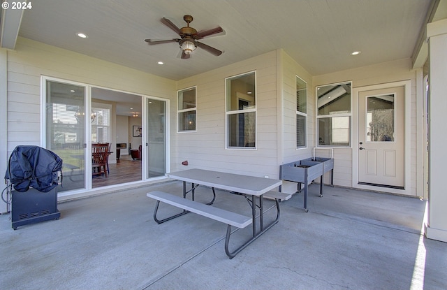 view of patio featuring ceiling fan