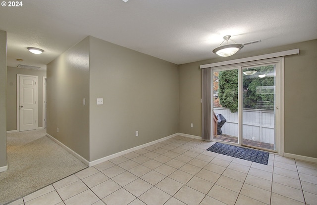 interior space featuring a textured ceiling