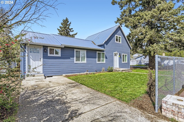 view of front of home with a front lawn