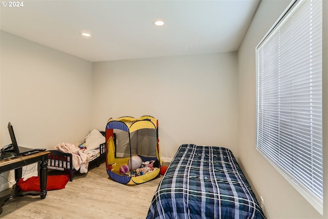 bedroom featuring wood-type flooring