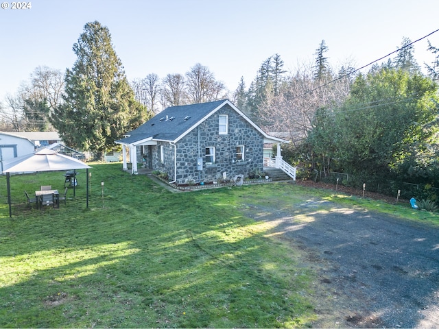 exterior space featuring a yard