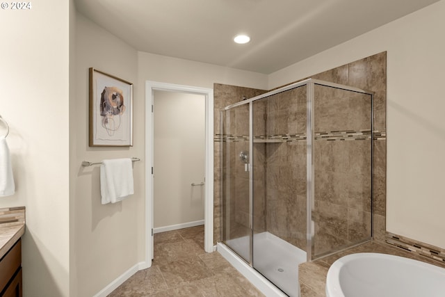 bathroom with vanity and plus walk in shower