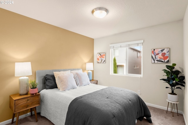 bedroom featuring carpet