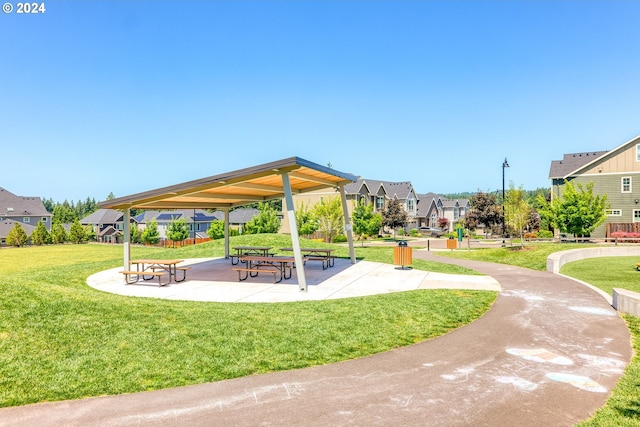 view of community featuring a gazebo and a lawn