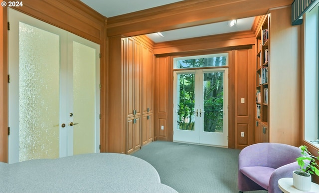 bedroom with light carpet and crown molding