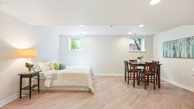 kitchen with a tray ceiling, independent washer and dryer, light tile patterned flooring, and sink