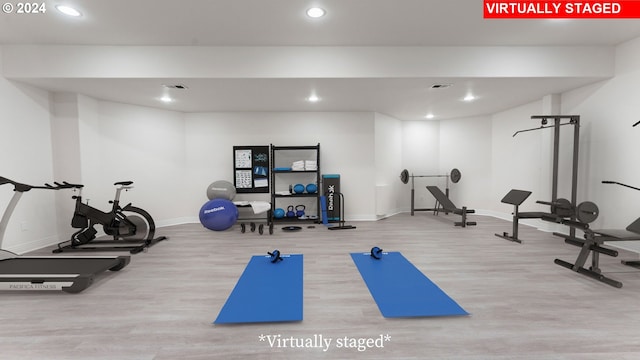 playroom featuring light wood-type flooring and pool table