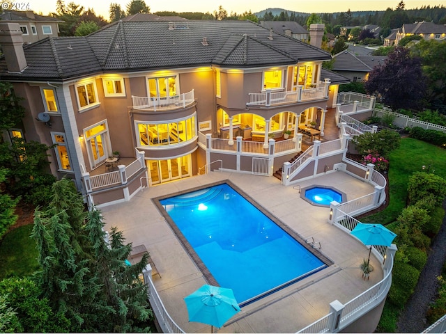 view of patio featuring a fenced in pool