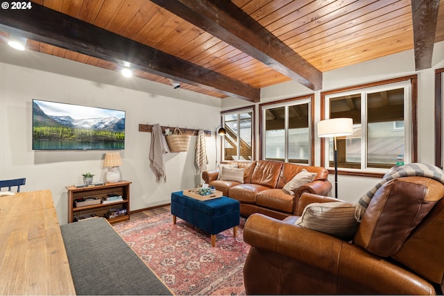 living room featuring beamed ceiling, wood ceiling, and hardwood / wood-style floors