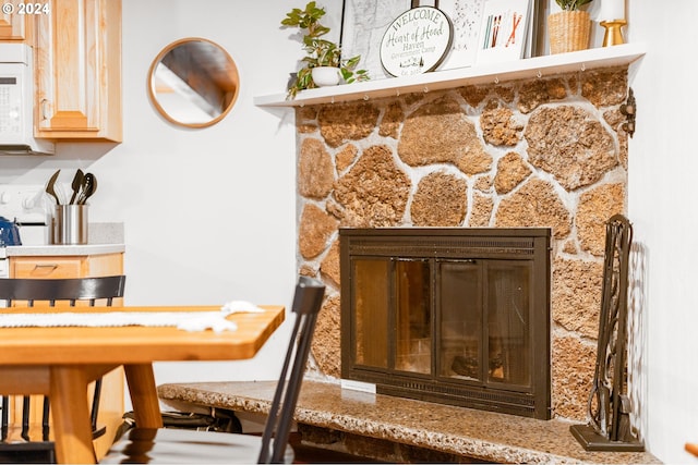 details featuring a stone fireplace