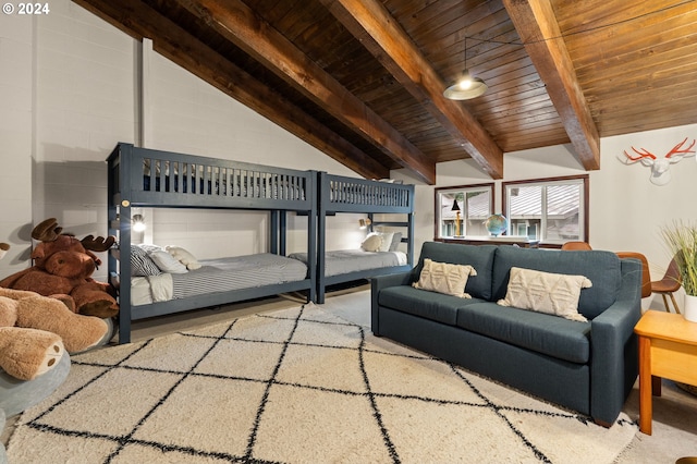 bedroom featuring lofted ceiling with beams and wood ceiling