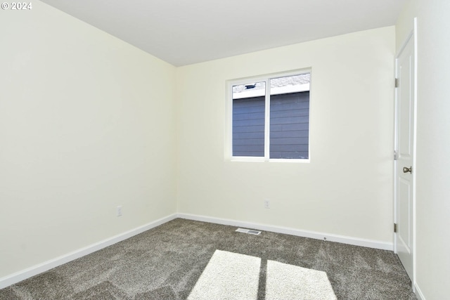 view of carpeted spare room