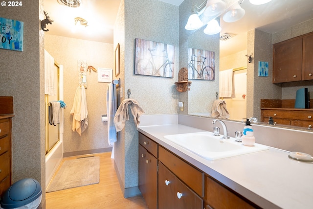 bathroom with vanity and wood-type flooring