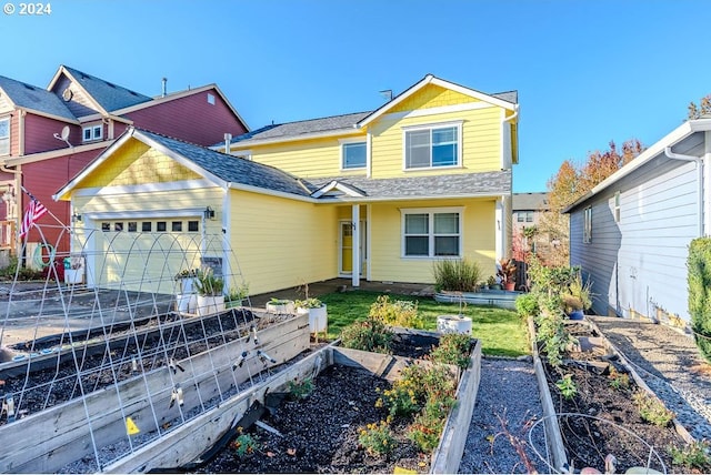 view of front of home featuring a garage