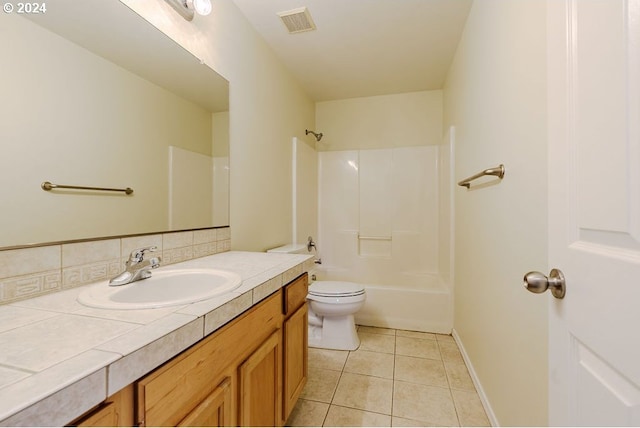 full bathroom with toilet, tile patterned flooring, shower / bathing tub combination, tasteful backsplash, and vanity