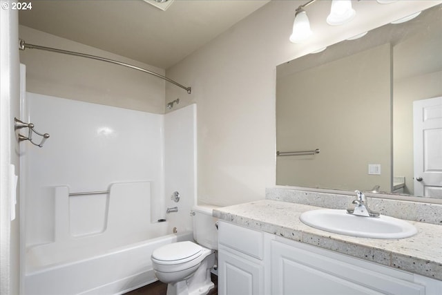 full bathroom with vaulted ceiling, vanity, bathtub / shower combination, and toilet