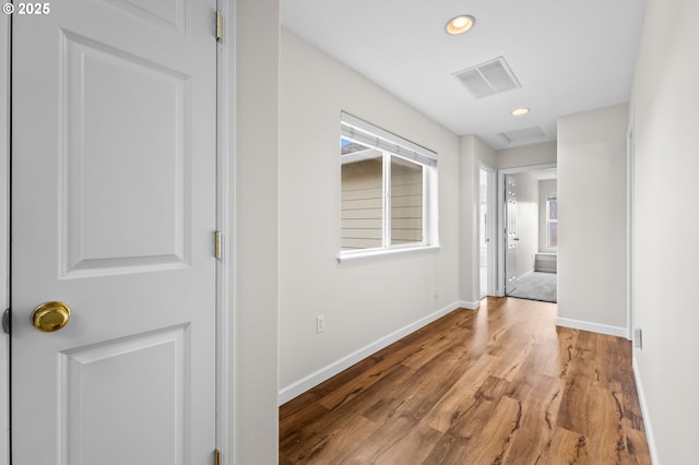 corridor featuring light hardwood / wood-style flooring