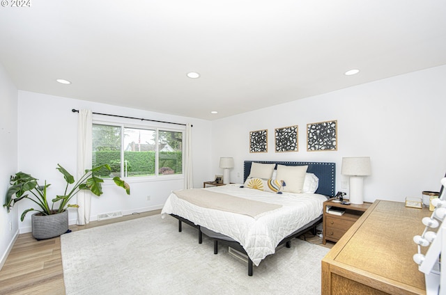 bedroom featuring hardwood / wood-style flooring