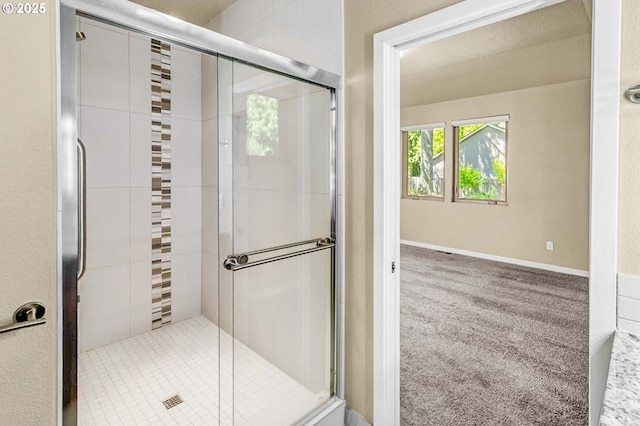 bathroom with a stall shower
